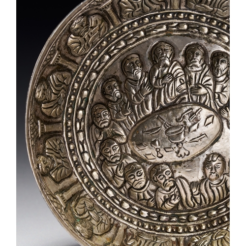 85 - AN OTTOMAN BALKAN REPOUSSE SILVER BOWL DEPICTING THE LAST SUPPER, 18TH CENTURY A silver bowl of circ... 