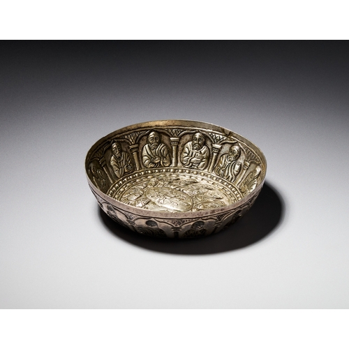 85 - AN OTTOMAN BALKAN REPOUSSE SILVER BOWL DEPICTING THE LAST SUPPER, 18TH CENTURY A silver bowl of circ... 