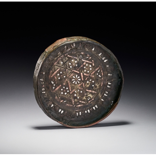 86 - A SELJUK SILVER AND COPPER INLAID BRONZE DISH, KHURASAN PERSIA, 12TH - 13TH CENTURY Features decorat... 