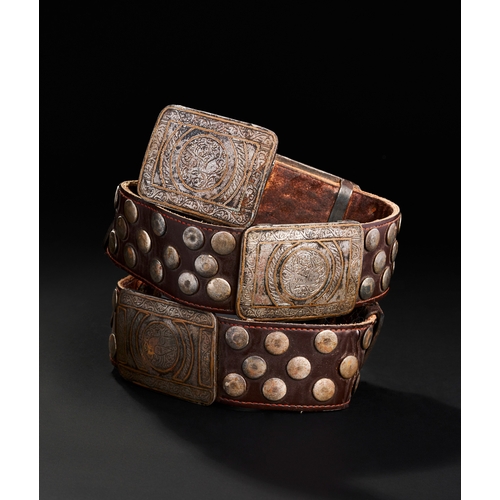 96 - A LEATHER BELT WITH BRONZE AND METAL MOUNTS PROBABLY SELJUK OR OTTOMAN A LEATHER BELT WITH BRONZE AN... 