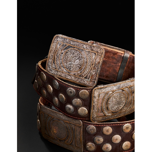 96 - A LEATHER BELT WITH BRONZE AND METAL MOUNTS PROBABLY SELJUK OR OTTOMAN A LEATHER BELT WITH BRONZE AN... 