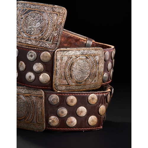 96 - A LEATHER BELT WITH BRONZE AND METAL MOUNTS PROBABLY SELJUK OR OTTOMAN A LEATHER BELT WITH BRONZE AN... 
