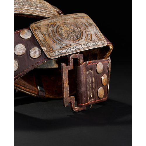 96 - A LEATHER BELT WITH BRONZE AND METAL MOUNTS PROBABLY SELJUK OR OTTOMAN A LEATHER BELT WITH BRONZE AN... 