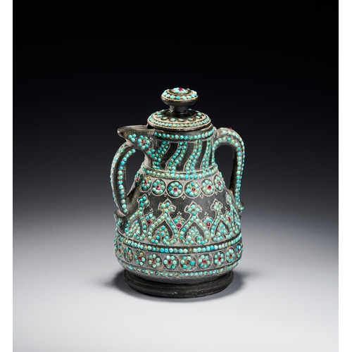 99 - A RARE QAJAR TURQUOISE INSET CARED STONE TEAPOT, PERSIA, 19TH CENTURY The vessel is carved from a da... 