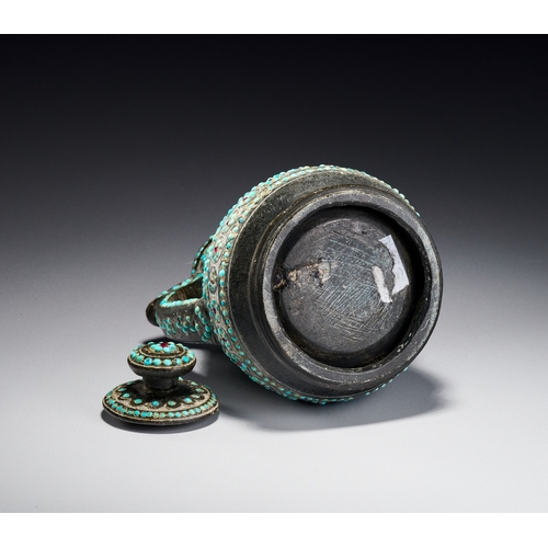 99 - A RARE QAJAR TURQUOISE INSET CARED STONE TEAPOT, PERSIA, 19TH CENTURY The vessel is carved from a da... 