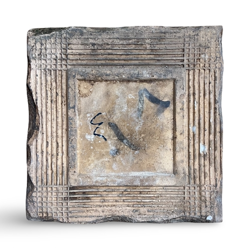 70 - A QAJAR CUERDA SECA POTTERY TILE, PERSIA, 19TH CENTURY This square earthenware tile is decorated in ... 