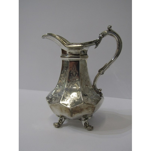 28 - VICTORIAN SILVER MILK JUG, octagonal facetted form with engraved decoration and scroll feet, London ... 