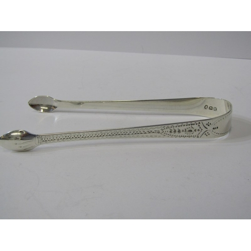 40 - GEORGIAN SILVER SUGAR TONGS, 1 bright cut design, other fiddle and shell, together with pair of silv... 