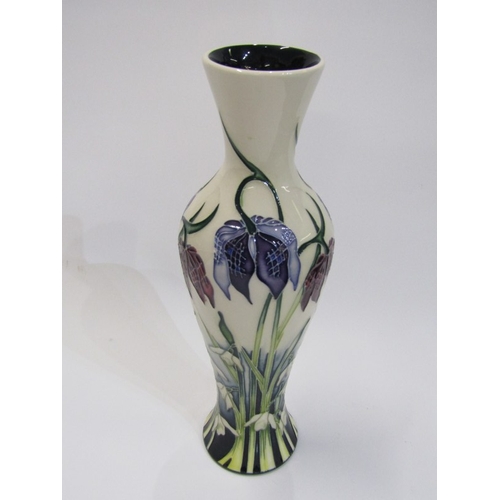 618 - MOORCROFT, modern Moorcroft 20 cms limited edition baluster form vase decorated bull rushes on a whi... 