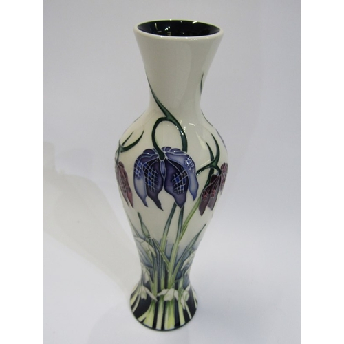 618 - MOORCROFT, modern Moorcroft 20 cms limited edition baluster form vase decorated bull rushes on a whi... 