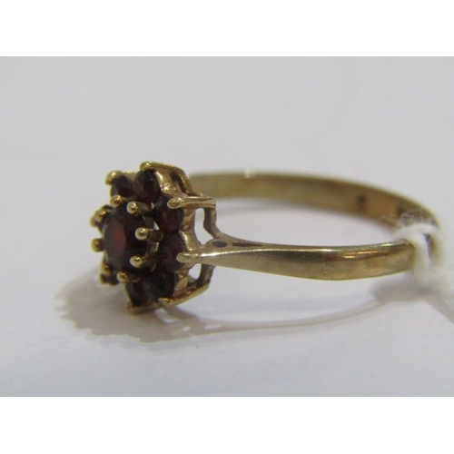 502 - GARNET RING, garnet ring, 9ct yellow gold ring set a cluster of garnets, size M