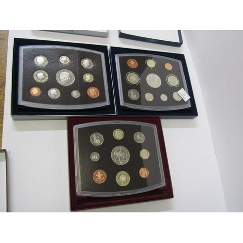 107 - UK PROOF COIN COLLECTIONS X 3, 2000 with five pounds, 2001 with £5 & two £2 & 2002 with a five pound... 