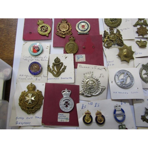 447 - CAP BADGES, a large box of assorted cap badges both English & Foreign including The Royal Scots, She... 