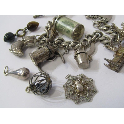 482 - SILVER CHARM BRACELET, with selection of silver and white metal charms including Mother Goose, horse... 