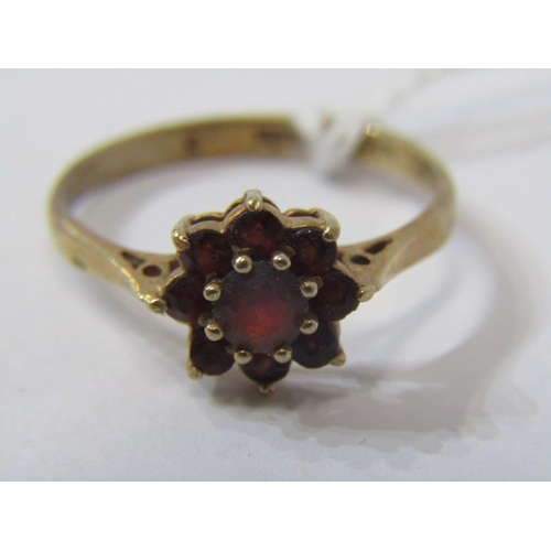 502 - GARNET RING, garnet ring, 9ct yellow gold ring set a cluster of garnets, size M