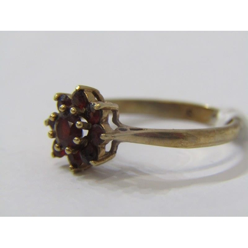 502 - GARNET RING, garnet ring, 9ct yellow gold ring set a cluster of garnets, size M