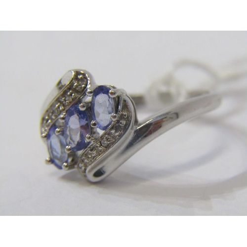 512 - 9ct WHITE GOLD 3 STONE TANZANITE & DIAMOND RING, oval cut tanzanite with accent brilliant cut diamon... 