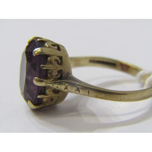 528 - 9ct YELLOW GOLD AMETHYST SOLITAIRE RING, large oval cut amethyst in multi claw setting, size M