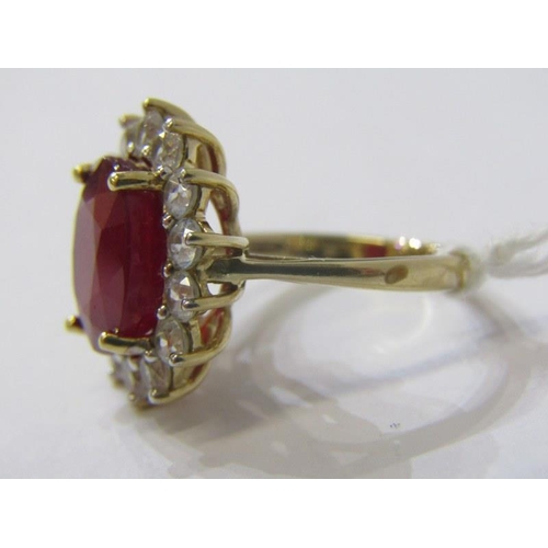 551 - RUBY CLUSTER RING, large oval ruby ring, cluster of white sapphires, 9ct gold band, size K, 5.5 gram... 