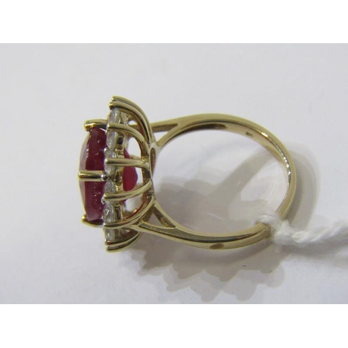 551 - RUBY CLUSTER RING, large oval ruby ring, cluster of white sapphires, 9ct gold band, size K, 5.5 gram... 