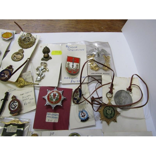 589 - CAP BADGES ETC. 2 boxes including cap badges, enamel badges etc. including Conduct of Triumph badges... 