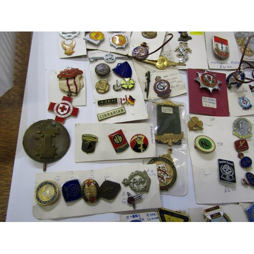 589 - CAP BADGES ETC. 2 boxes including cap badges, enamel badges etc. including Conduct of Triumph badges... 