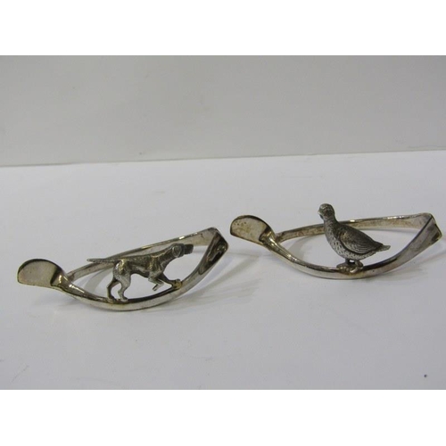 18 - CASED HUNTING DESIGN SILVER SERVIETTE RINGS, set of 6 silver serviette rings decorated with hunting ... 