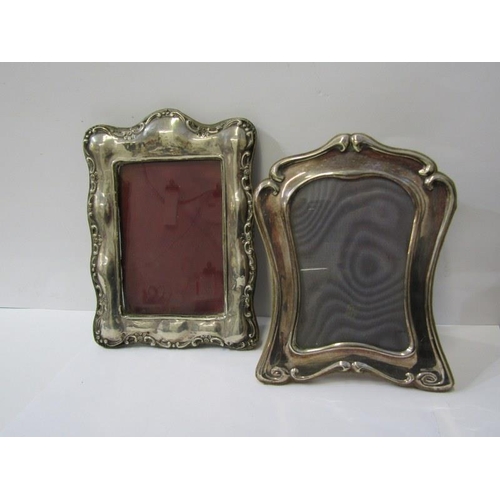 24 - EDWARDIAN SILVER PHOTO FRAME, 21cm easel photo frame with scroll edge, Birmingham 1909; together wit... 