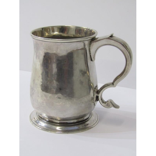49 - 18th CENTURY SILVER TANKARD, bell shaped with double scroll handle, rubbed mid 18th Century assay ma... 