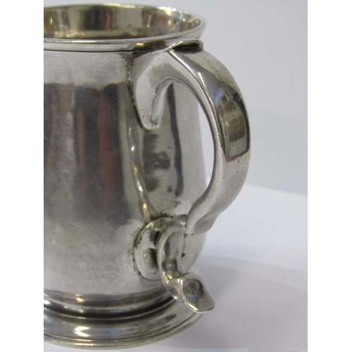49 - 18th CENTURY SILVER TANKARD, bell shaped with double scroll handle, rubbed mid 18th Century assay ma... 