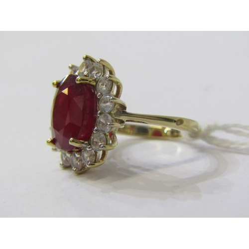 171 - RUBY CLUSTER RING, large oval ruby ring, cluster of white sapphires, 9ct gold band, size K, 5.5 gram... 