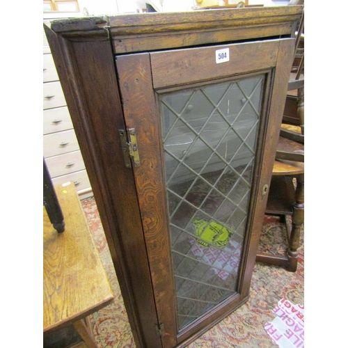 469 - CORNER CUPBOARD, leaded glass hanging oak corner cupboard