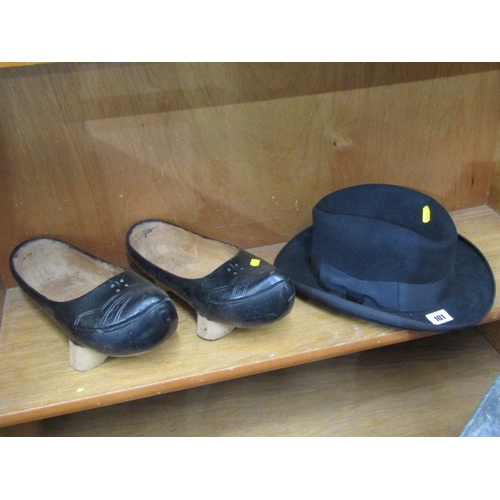 101 - FASHION, trilby hat by Dunn & Co, together with pair of carved wooden clogs