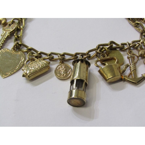 137 - CHARM BRACELET, collection of 9ct gold charms on rolled gold bracelet, charms including 9ct gold loc... 