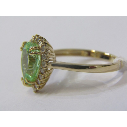 146 - GREEN SAPPHIRE & DIAMOND CLUSTER RING, 14ct yellow gold ring set a pear shaped green sapphire, surro... 