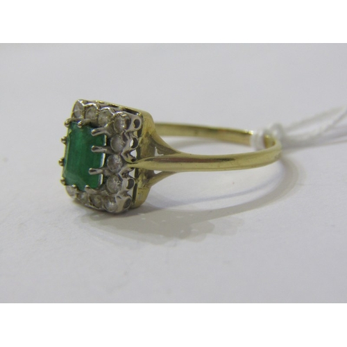 170 - EMERALD CLUSTER RING, 18ct yellow gold ring set a central rectangular form emerald within the cluste... 