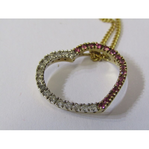 174 - DIAMOND ENCRUSTED HEART, 9ct yellow gold heart pendant encrusted with diamonds & pink sapphires on a... 