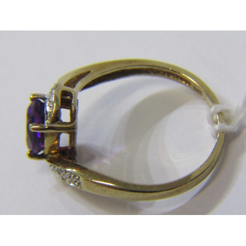 175 - AMETHYST & DIAMOND RING, 9ct yellow gold ring set central oval amethyst  with diamond shoulders in a... 