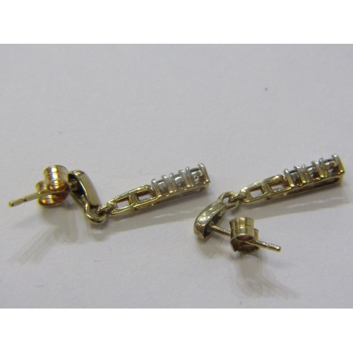 189 - DIAMOND DROP EARRINGS, pair of 9ct yellow gold earrings each set with 3 diamonds, 2.5cm drop