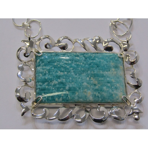 205 - LARGE SILVER PENDANT ON CHAIN, a large rectangular form  stone set pendant in silver mount on chain,... 