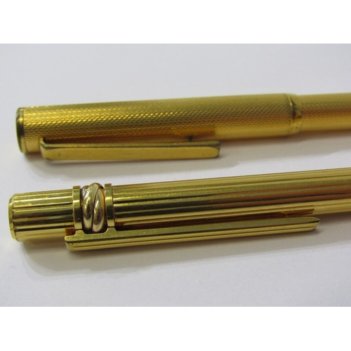 253 - CARTIER, gold plated ballpoint pen inscribed 