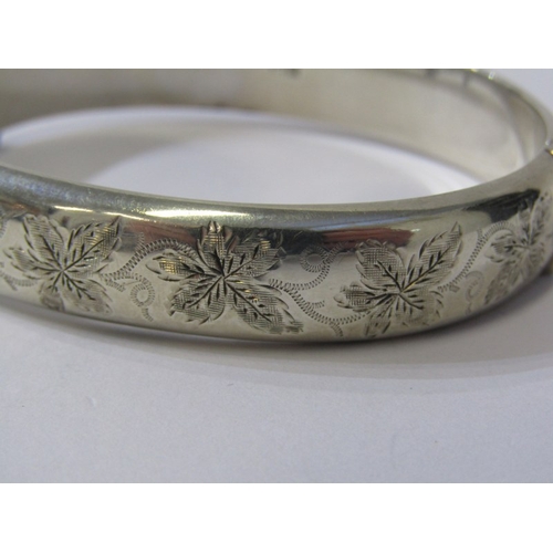 253A - SILVER HINGED BANGLE with foliate engraved decoration, Birmingham HM