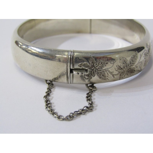 253A - SILVER HINGED BANGLE with foliate engraved decoration, Birmingham HM