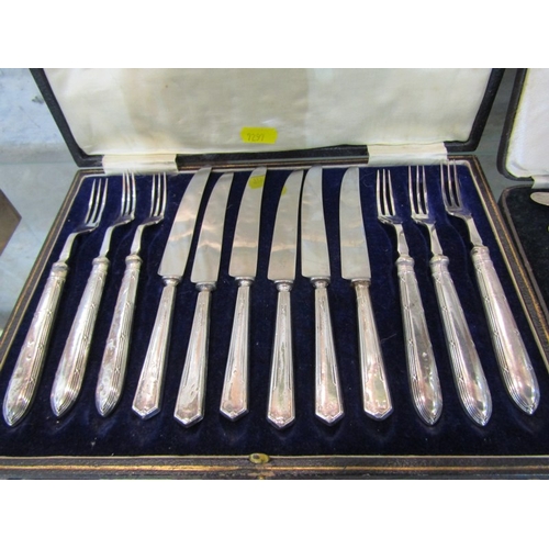 280 - SILVER HANDLED CUTLERY, 2 boxed sets of cutlery with silver handles, one containing 6 tea knives and... 