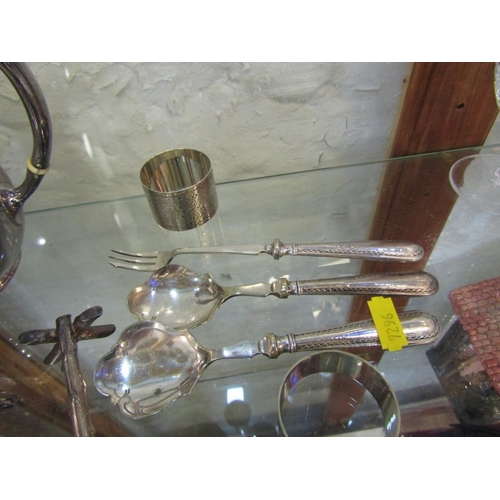 291 - SILVER PLATE, 2 sugar dredger spoons, carver rest, serving spoons and silver serviette ring