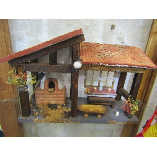 293 - MODEL ECUADORIAN KITCHEN together with collection of 5 novelty Ecuadorian costume figures