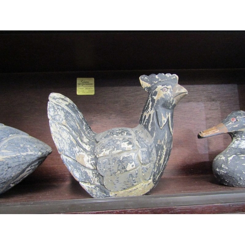 35 - CARVED WOODEN ORNAMENTS, 2 carved duck figures, together with a similar chicken figure