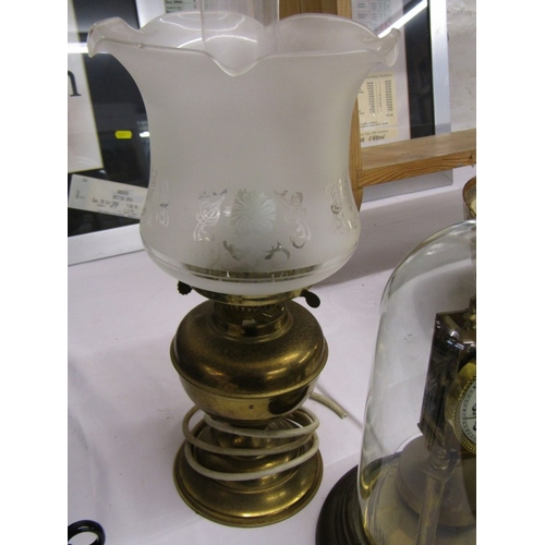 352 - DOMED 400 DAY MANTEL CLOCK and brass based table lamp in oil lamp design