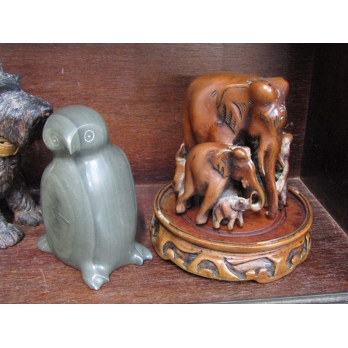 38 - CARVED ANIMAL FIGURES, Inuit carved figure of a bird, a Radley advertising figure of a terrier,  ele... 