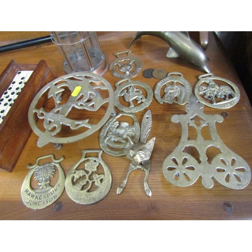 417 - BRASSWARE, selection of horse brasses, 2 brass trivets, 1 with anchor design to centre, also a pair ... 